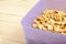 Fried splited cashews on a wooden table