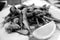 Fried sprat serving in black and white