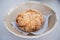 Fried steamed bun with white sesame sprinkle