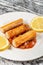 Fried Surimi Sticks With Lemons On The Grey Marble