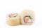 Fried sushi roll with salmon, cream cheese and avocado . Japanese food. Hot roll with a crisp crusty on a white background.