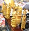 Fried swirl potato spiral on a stick during street food festival