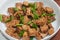 Fried teriyaki Tofu with scallions and sesame seeds. Healthy vegan meatless meal rich in protein