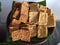 Fried tofu and tempeh on a banana leaf base. Indonesian special food.