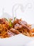 Fried veal meat slice with noodles