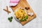 Fried wanton with lemon Chinese food top view on wooden cutting board