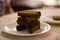 Fried wheat bread sticks put down on plate like pyramid. Appetizer. Selective focus