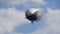 Friedrichshafen, Germany - April 9, 2023: Modern Zeppelin airship in the sky
