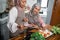 friend with hijab looking at tablet to make new food