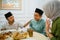 friend supports man due to hunger waiting for iftar time