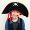 The friendliest pirate youll ever meet. a little boy wearing a pirate costume against a white background.