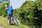 Friendly Adult Male Athlete Wearing Helmet Cycling