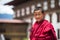 Friendly Bhutanese young Buddhism monk in Dzong , Thimphu , Bhutan