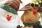 Friendly company of Santa Claus and his animal friend, smiling soft toys, New Year card