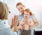 Friendly doctor pediatrician with patient child at clinic