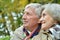 Friendly elderly couple spending time outdoor