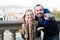 Friendly father and daughter pointing at sight during sightseeing tour