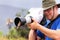 Friendly Galapagos flycatcher sitting on a lens hood, Santiago I