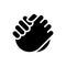 Friendly handshake black glyph icon