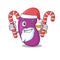 Friendly kidney dressed in Santa Cartoon character with Christmas candies