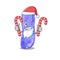 Friendly legionella in Santa Cartoon character holds Christmas candies