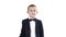 Friendly little boy in a suit says hi and then says bye on white background.
