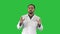 Friendly male medicine therapeutist doctor walking and talking looking in camera on a Green Screen, Chroma Key.