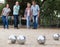 friendly mature couples playing petanque at leisure