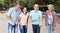 friendly mature couples playing petanque at leisure