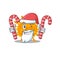 Friendly nobecovirus in Santa Cartoon character holds Christmas candies