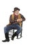 Friendly old cowboy sits in rocking chair
