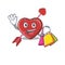 A friendly rich heart and arrow waving and holding Shopping bag