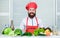 Friendly service. Happy bearded man. chef recipe. Vegetarian salad with fresh vegetables. Dieting organic food. Healthy