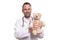 Friendly smiling paediatrician holding a teddy bear