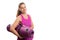 Friendly sporty woman holding yoga mat with copyspace