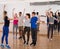 Friendly teens studying folk style dance