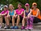 Friends in colorful workout gear playful pose