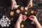 Friends decorating christmas gingerbread cookies