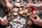 Friends decorating christmas gingerbread cookies