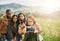 Friends dont let friends be silly alone. a group of friends taking a selfie while standing outside.