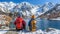 Friends enjoying scenic alpine lake view with majestic mountains in the background