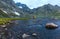 Friends fishing at Vishnusar lake on Kashmir great lakes trek in Sonamarg, India.