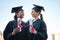Friends graduate, graduation and university success celebration of women together outdoor. Education, study scholarship
