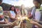 Friends having fun with sparkler at the summer festival