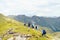 Friends hiking on a pathway in Fagaras Mountains