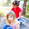 Friends kid girls playing in forest rock