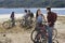 Friends With Mountain Bikes By The Lake