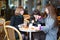 Friends in a Parisian street cafe