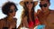 Friends, phone and selfie at a beach for travel, relax and fun with group bonding in summer. Happy, people and smile for