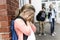 Friends at a playground bullying about other girl in foreground